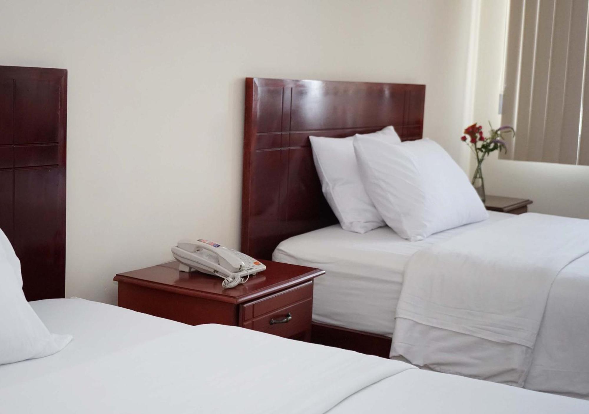 Hotel Lottus Quito Pokoj fotografie